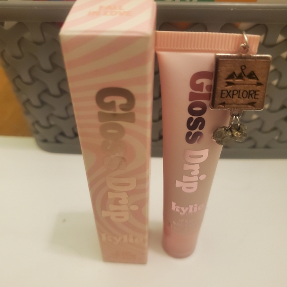 Kylie Cosmetics Other - Kylie Cosmetics gloss drip FALL IN LOVE/sheer red berry with charm attached.